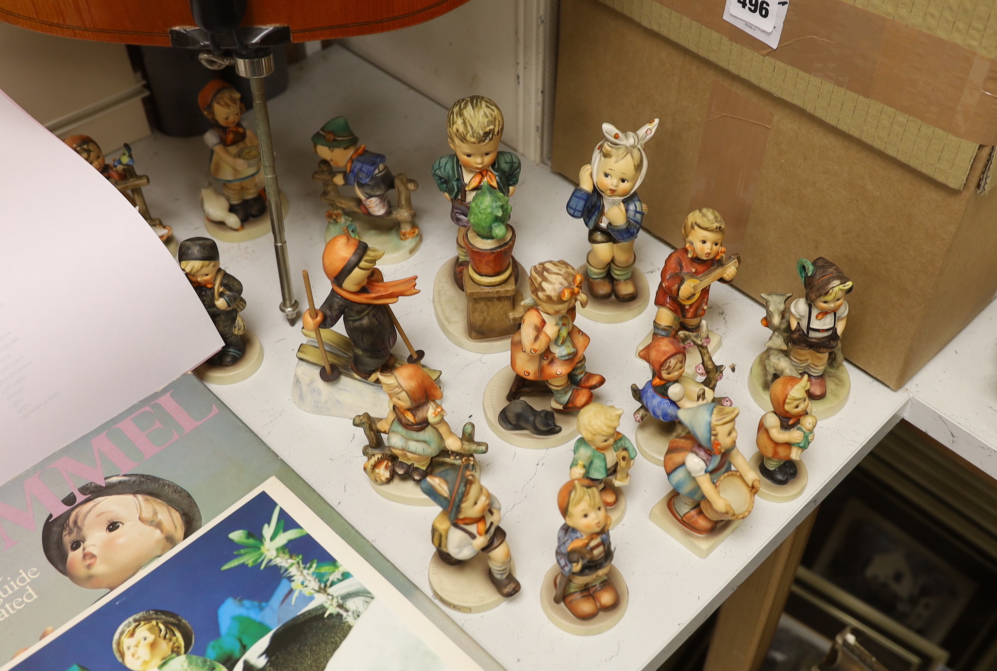 A collection of Hummel / Goebel figures